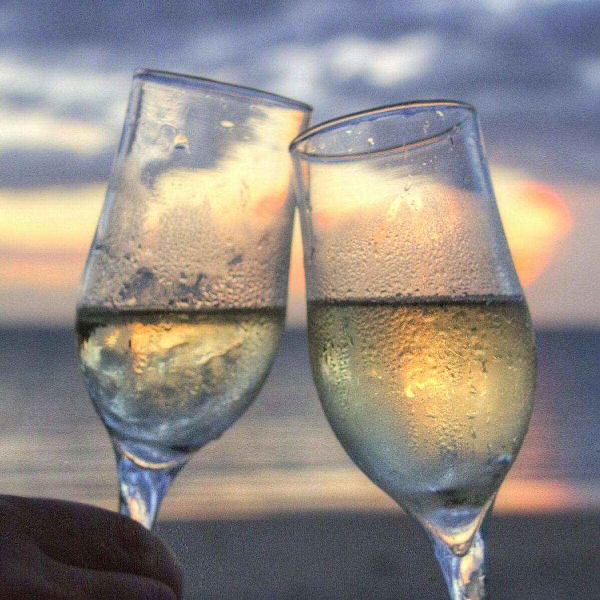 Two People Toasting Flute Glasses