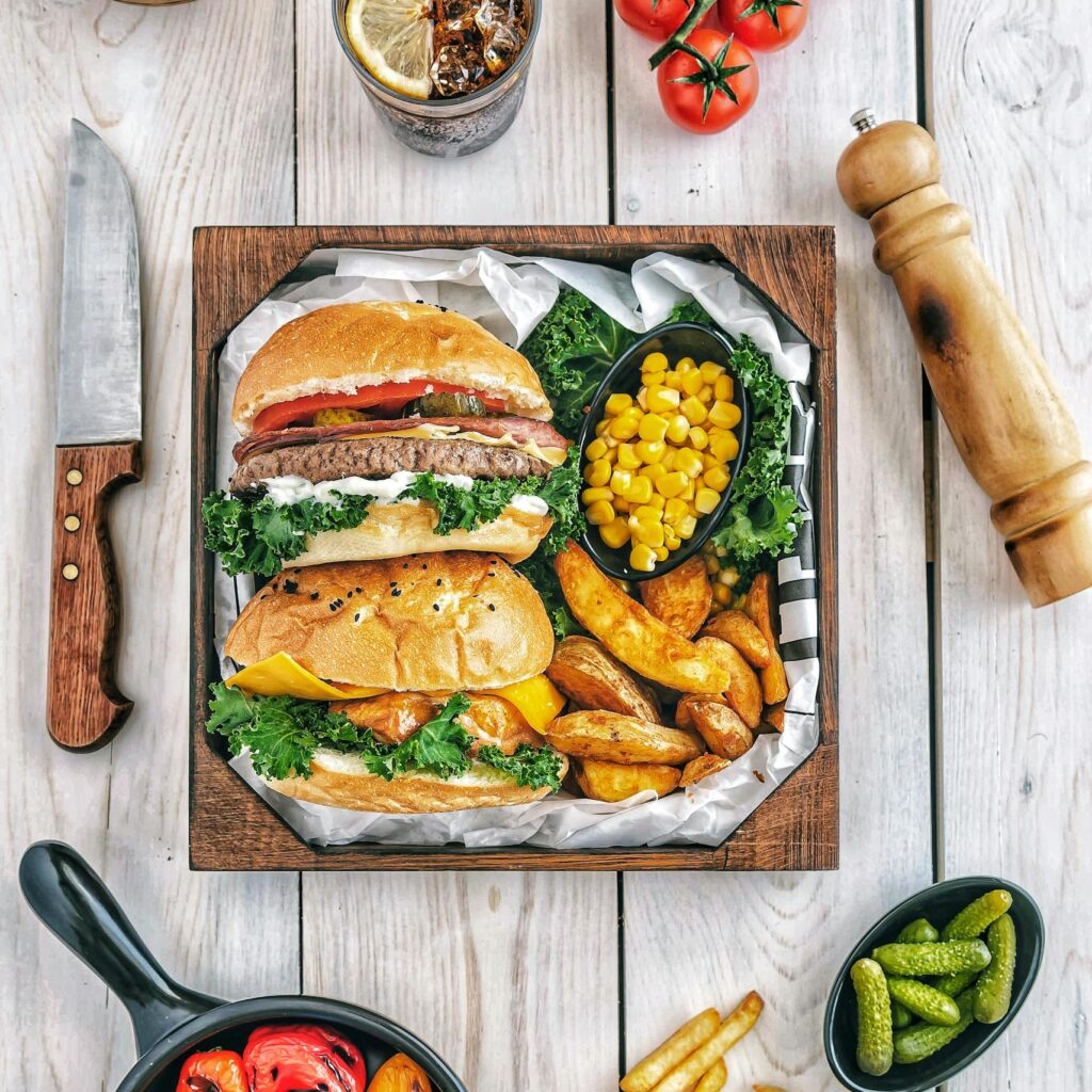 Burgers With Fries and Tomatoes