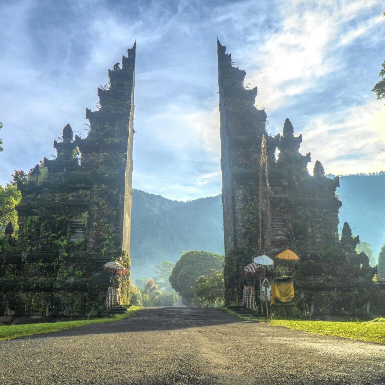 Stunning view of the Handara Gate in Bali with mountains and lush greenery.
