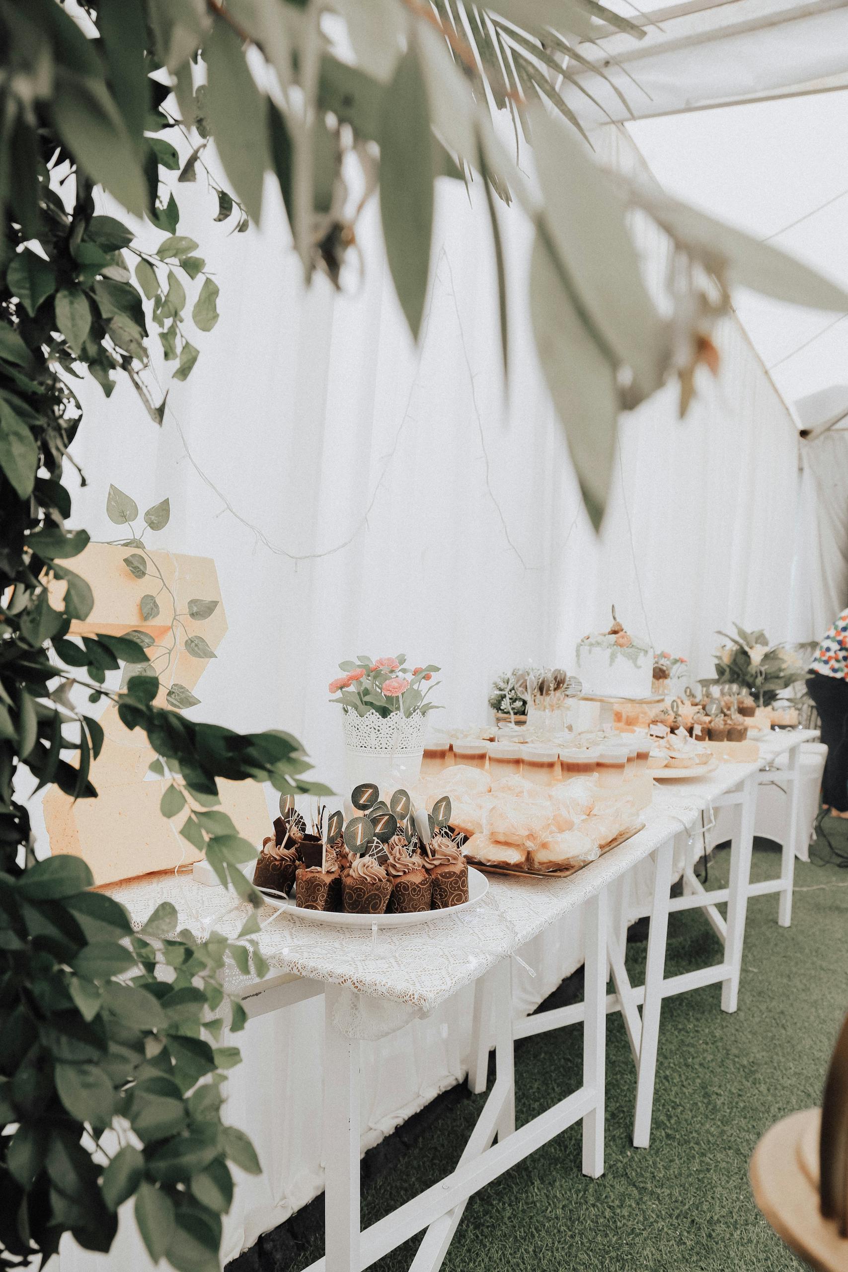 A beautifully arranged dessert table with various treats suitable for celebrations.