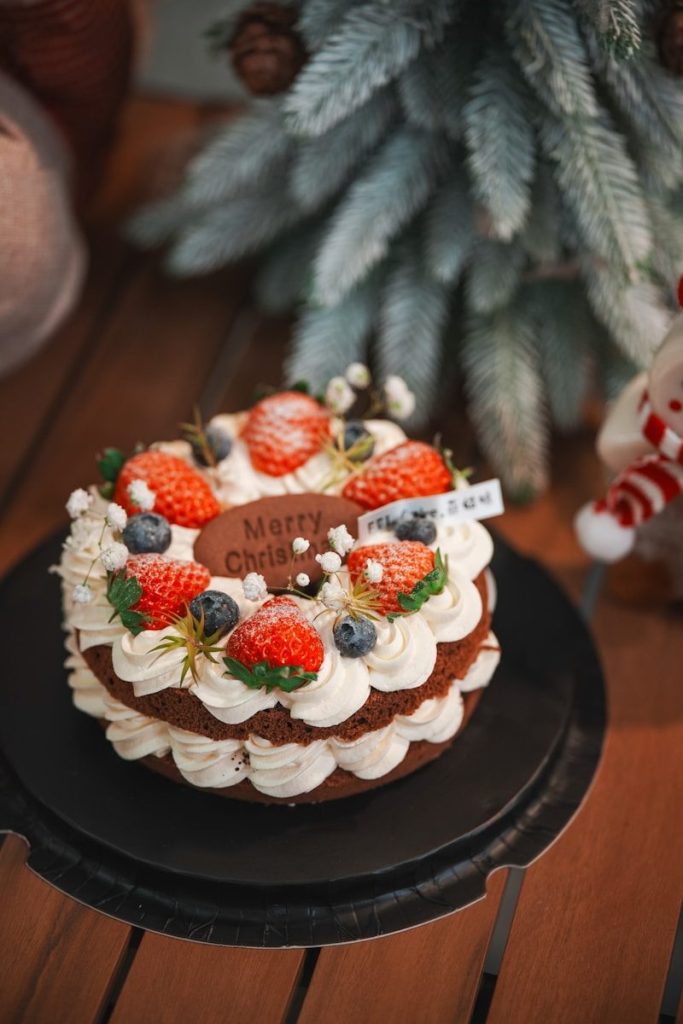 Christmas cake with strawberries and blueberries
