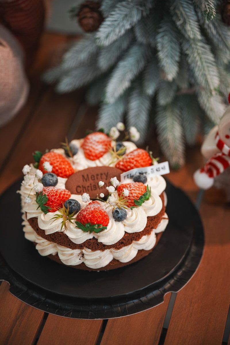 Christmas cake with strawberries and blueberries